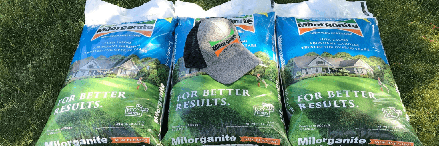 Bags of Milorganite and Milorganite grey trucker hat