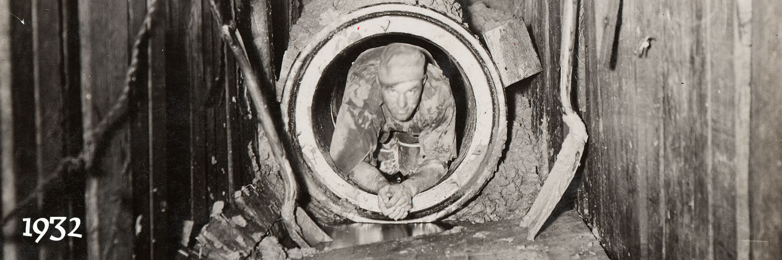 man crawling in tunnel