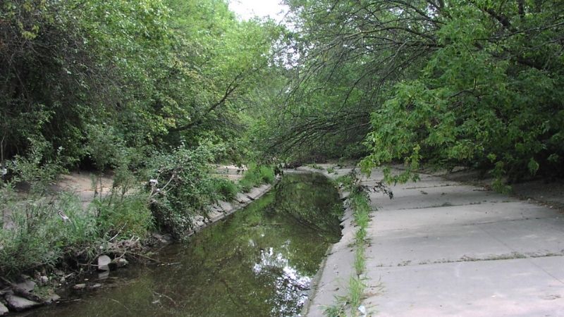 concrete lined kinnickinnic river in Jackson Park